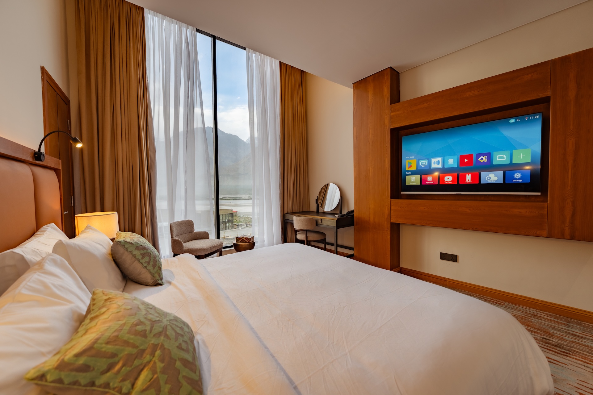 Deluxe Suite at FortuNorth Shigar Valley — elegant mountain suite with Karakoram views